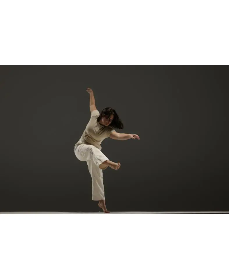 Solo dancer balancing on one foot
