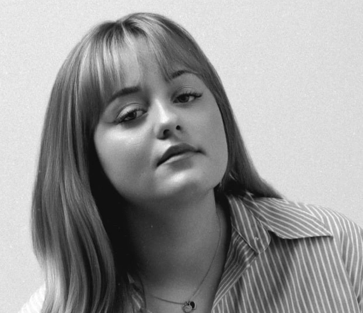 Black-and-white portrait of a young woman